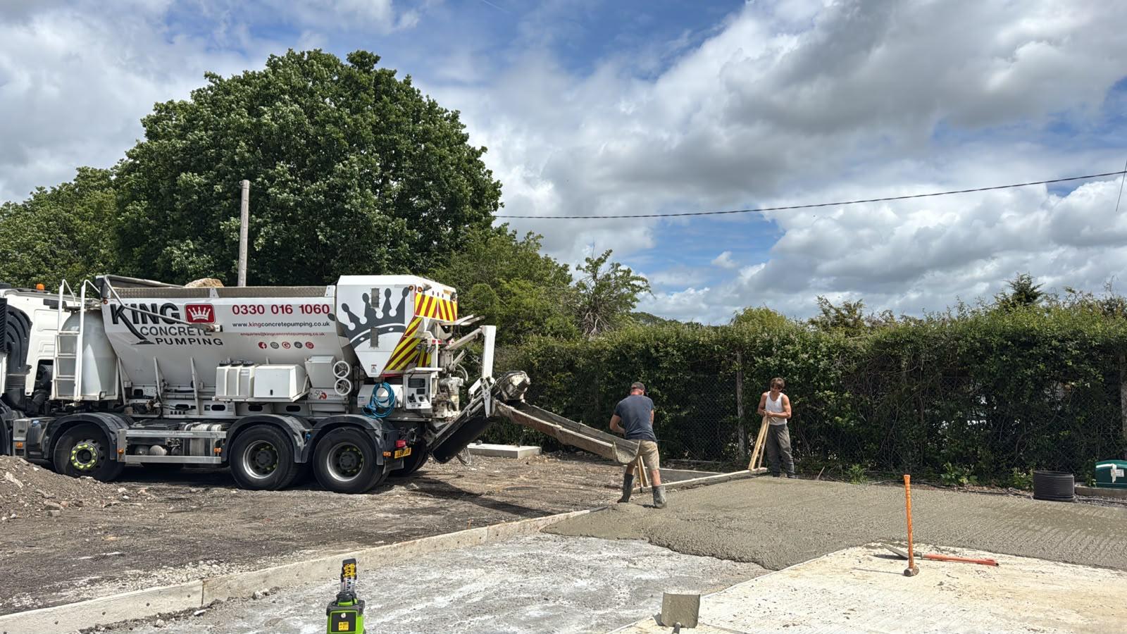 King Concrete Pumping crew placing concrete on a Redhill site